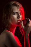 allure woman with red apple 