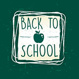 back to school with apple in frame over green old paper backgrou