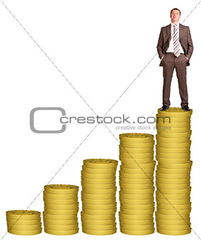 Businessman on golden coins stack 