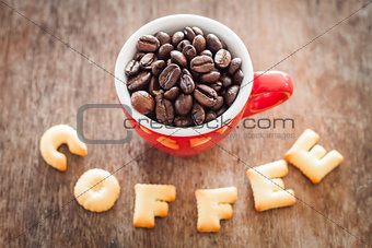 Coffee alphabet biscuit with red coffee cup