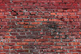 Old brick wall with red bricks