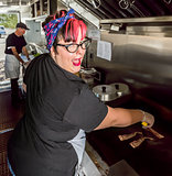 Upbeat Chef in Food Truck
