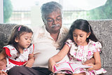 Family reading story book together