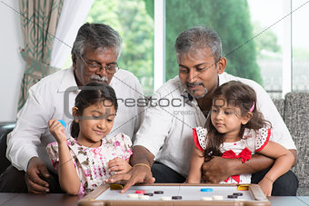 Multi generations family playing games