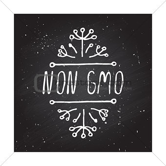 Non GMO - product label on chalkboard.