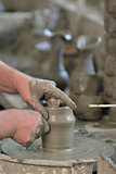 Potter's hands making a pot