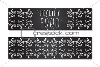 Hand-sketched herbal banners on chalkboard background.