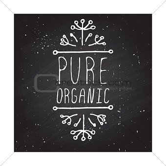 Pure organic - product label on chalkboard.