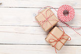Gift wrapping over wooden table