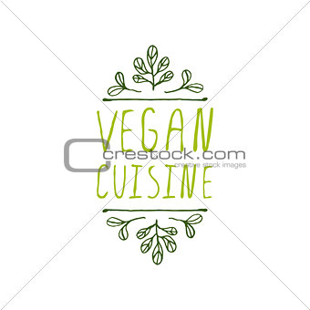 Vegan Cuisine - product label on white background.