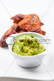 Grilled chicken wings with guacamole