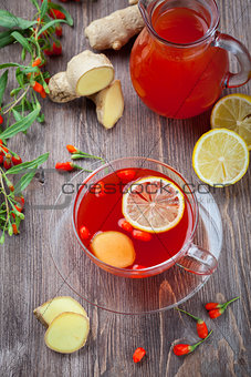 Tea with fresh goji berries and ginger