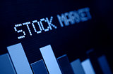 Stock Market - Column Going Down on Blue Display