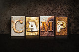 Camp Letterpress Concept on Dark Background