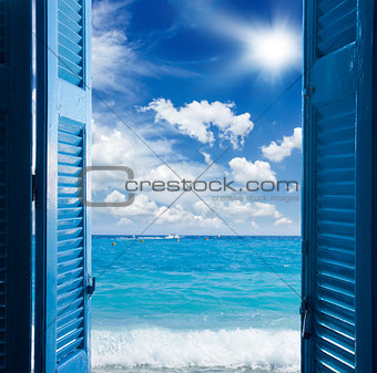 room with open door  to seascape