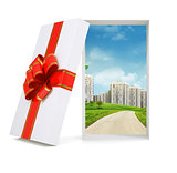 Cityscape in gift box on white