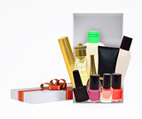 Gift box with cosmetics on white