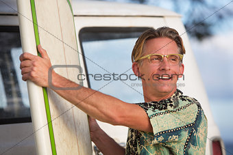 Cheerful Man with Surfboard