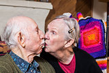 Elderly Couple Kissing