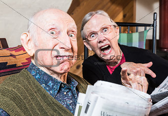 Old Mad Couple with Newspaper