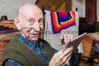 Elder Gentleman with Tablet