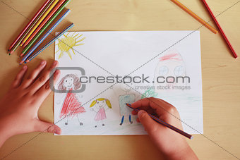Happy child drawing