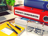 Perfect Candidates on Red Office Folder. Toned Image.
