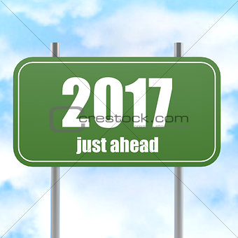 Street Sign With 2017 Just Ahead in Blue Sky