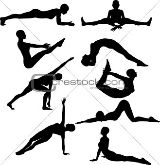Silhouettes of females in yoga poses
