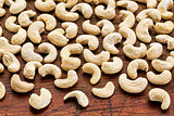 cashew nuts on rustic weathered wood