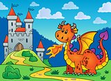 Happy orange dragon near castle