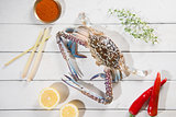 Top view raw blue crab and ingredients