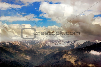 Mountain Peak with mist and clouds landscape