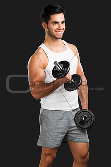 Athletic man lifting weights