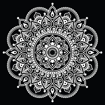 Mehndi, Indian Henna tattoo white pattern on black background