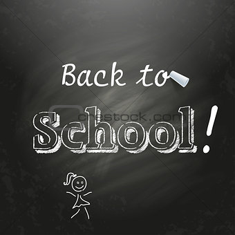 Back to School  written on a black chalkboard with white chalk.