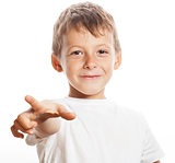 little cute boy pointing in studio isolated close up