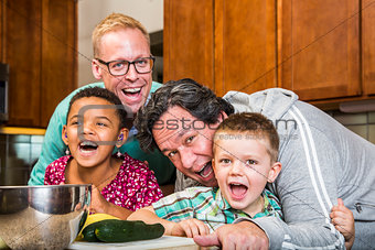 Laughing Family with Gay Dads in Kitchen
