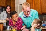 Male Couple and Kids in Kitchen