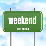 Weekend word on green road sign