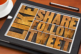 like, share, tweet, follow words on tablet