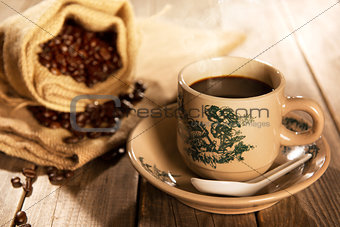 Traditional style Hainan coffee in vintage mug