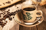 Traditional style Hainanese coffee in vintage mug