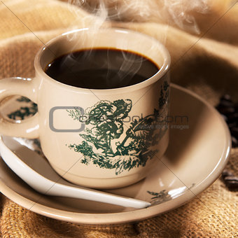 Traditional kopitiam style Chinese coffee in vintage mug