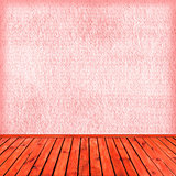 Empty pink interior: concrete wall, wooden floor