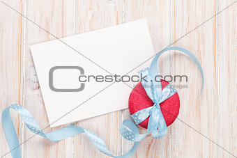 Photo frame or greeting card and macarons with ribbon