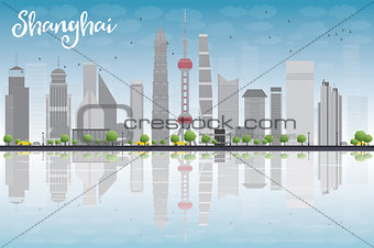 Shanghai skyline with blue sky and grey skyscrapers