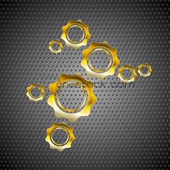 Golden gears on perforated metal background