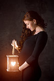 Beautiful pregnant woman enjoys new life