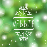 Veggie product label on blurred background